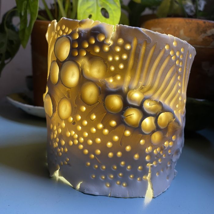 Photophores en porcelaine avec impressions de feuilles