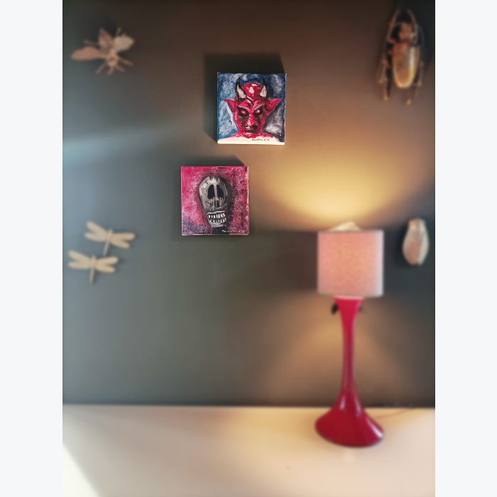 Lot de deux peinture toiles : diable et tête de mort