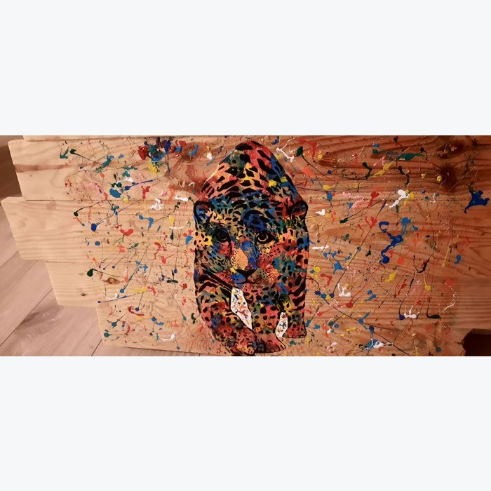 Tableau guépard sur planches de bois assemblées