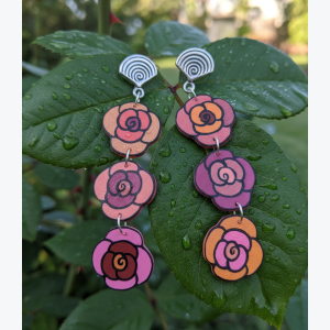 Boucles d'oreilles trois roses longues